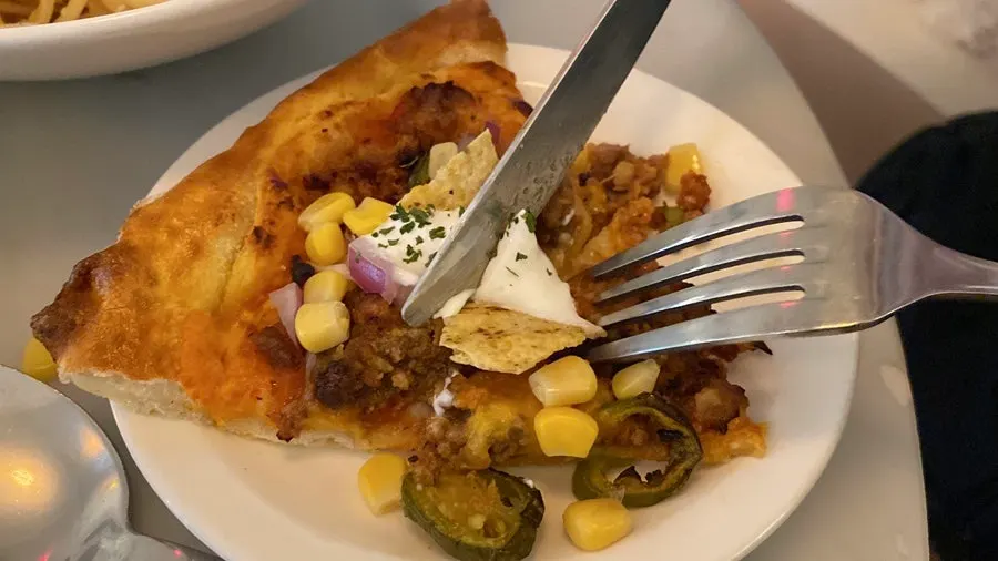 Pickles' taco pizza with Mexican-style toppings