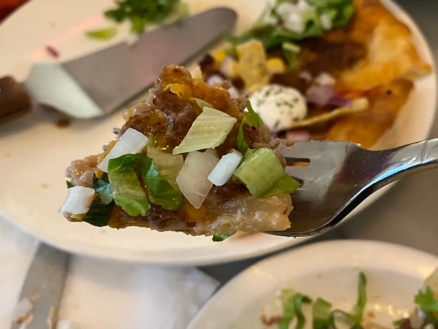 Close-up of the beef cheeseburger pizza toppings