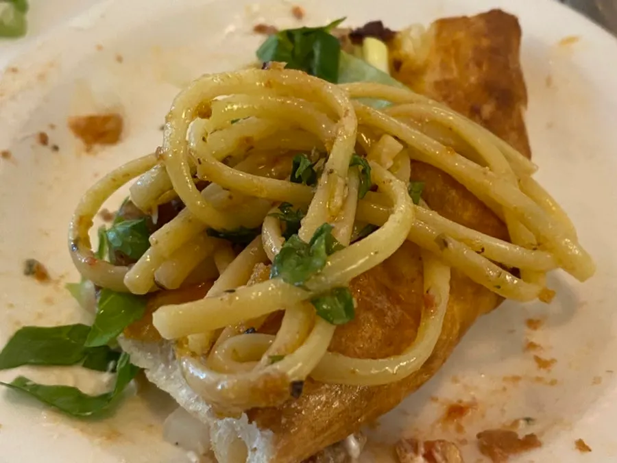 The pizza and pasta spread eaten as a hangover cure