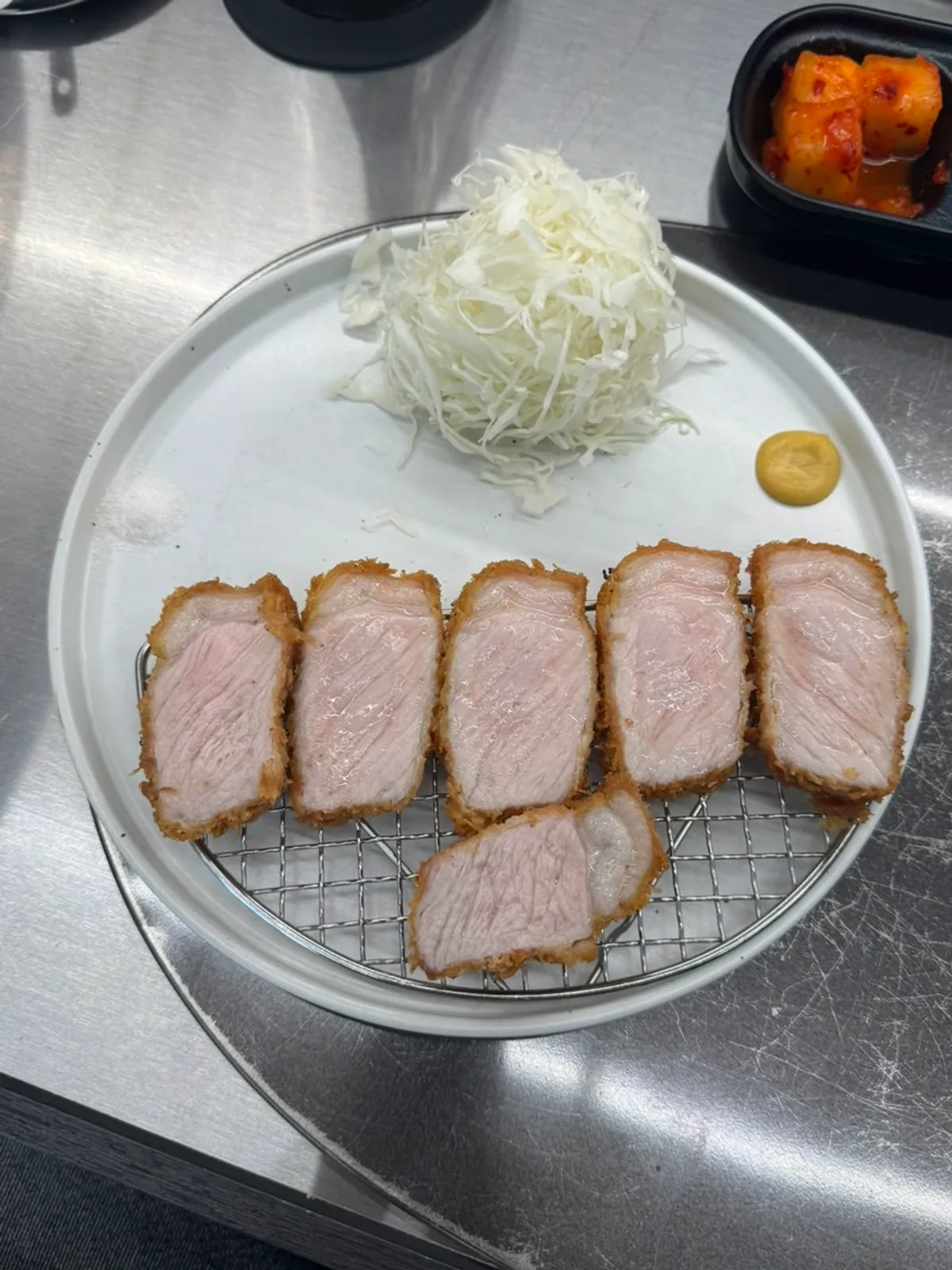 Jeju black pork loin katsu with the oil drained off