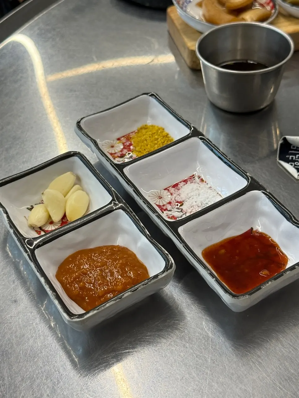 Plate of pickles and gat kimchi