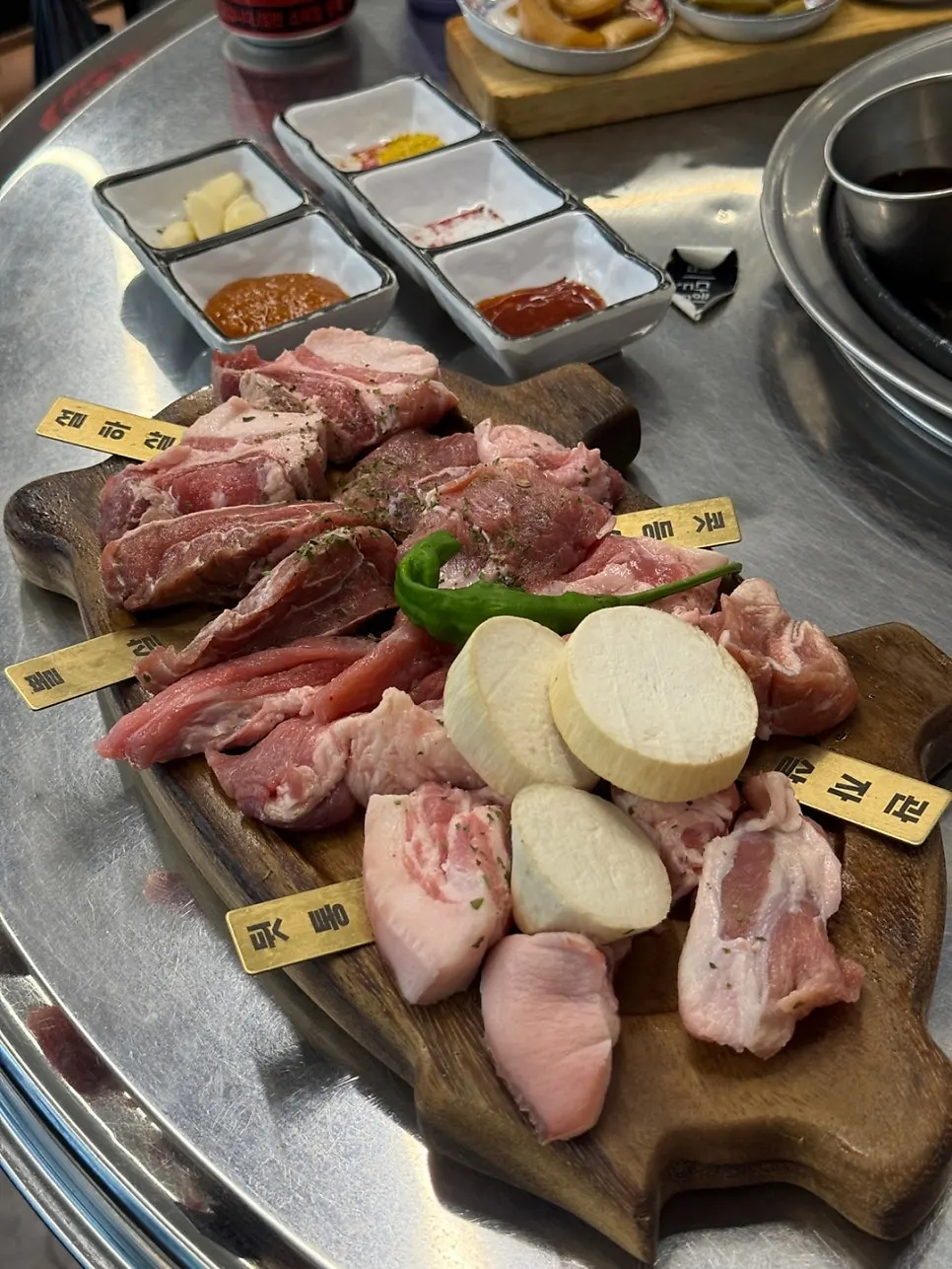 Plate of specialty cuts before grilling