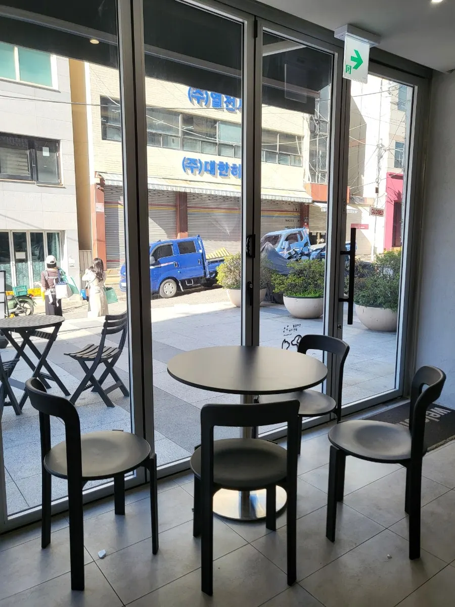 Window seat with large glass at Ibaba Coffee
