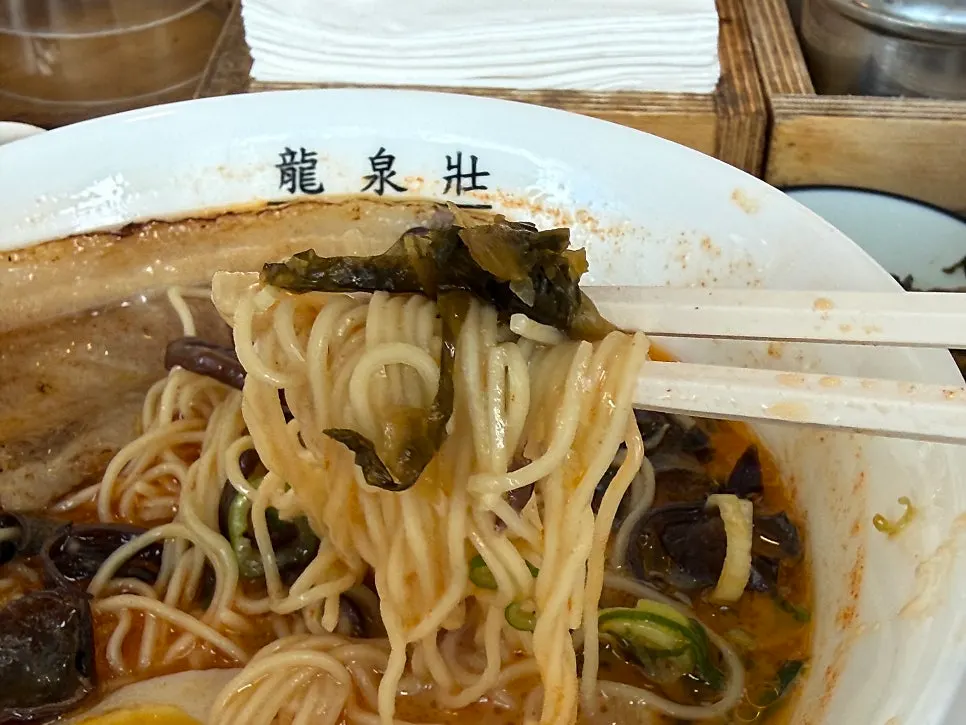 Tonkotsu broth showing wood ear mushroom topping