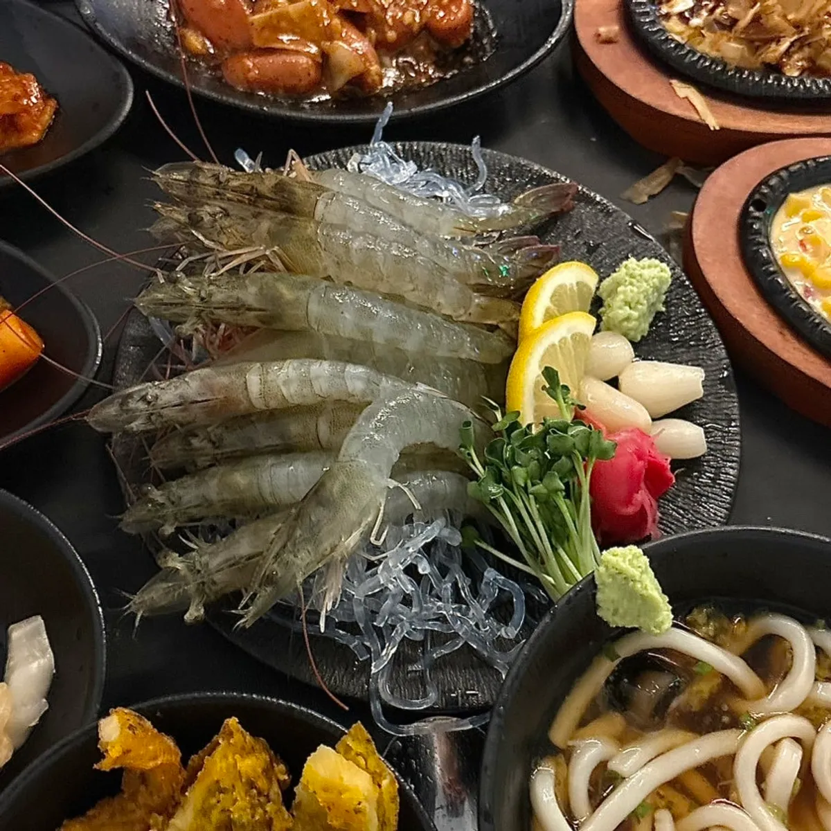 Plate of live raw shrimp with shells removed