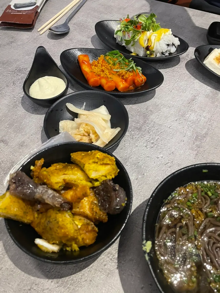 Full banchan spread served as the basic table setting at Rigo Susan