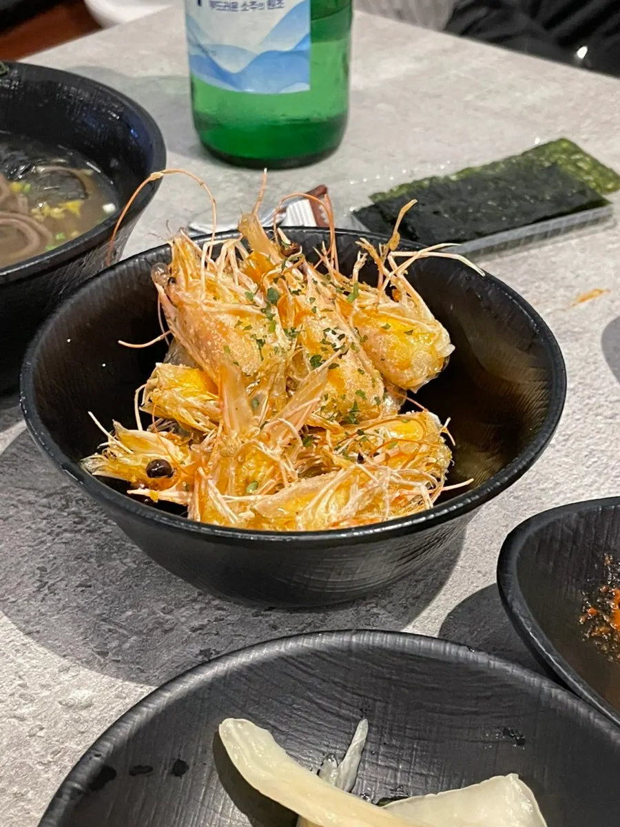 Close-up of the springy-textured raw shrimp sashimi