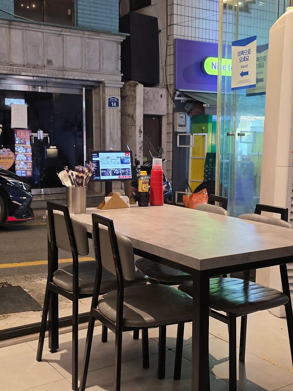 Clean, modern seating at Rigo Susan Jeonpo Station Main Branch