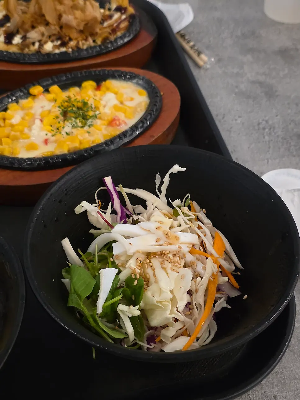 Large tray packed with side dishes