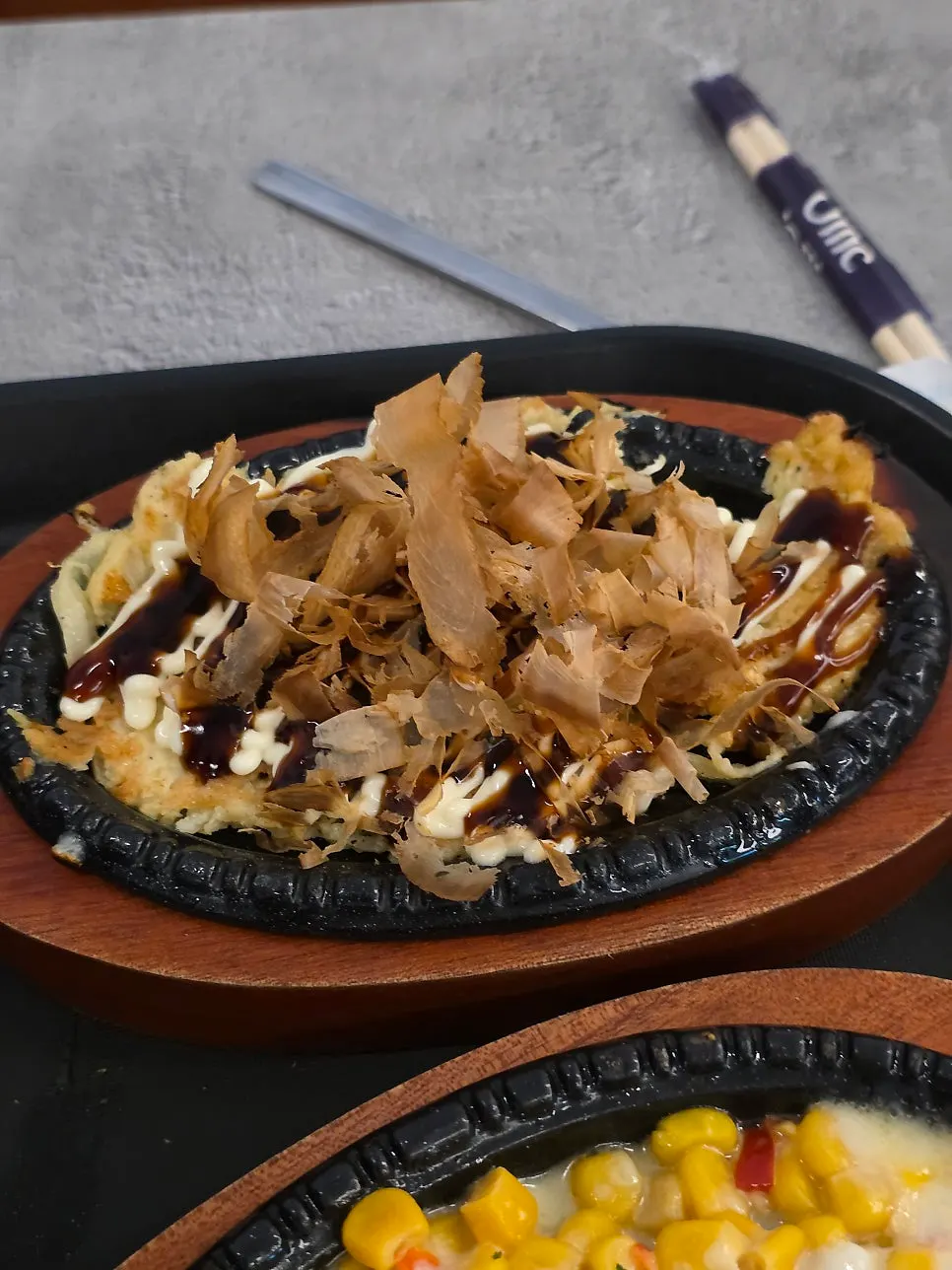 Corn cheese and okonomiyaki served as basic side dishes