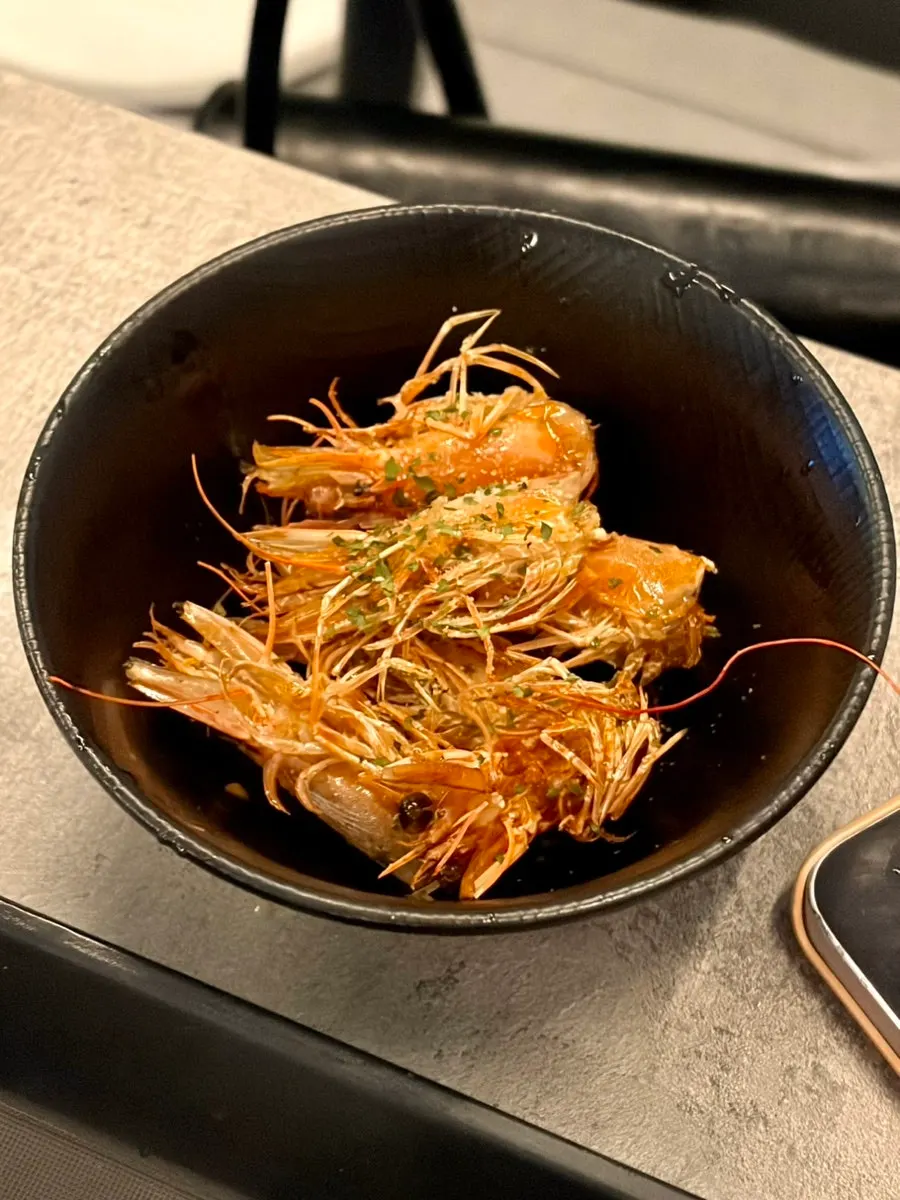Leftover shrimp heads after eating the shrimp bodies