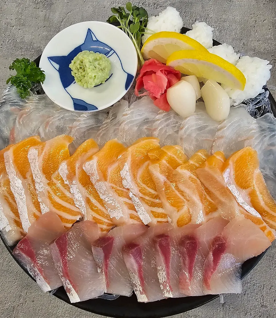 Mixed sashimi platter of amberjack, salmon, and flatfish