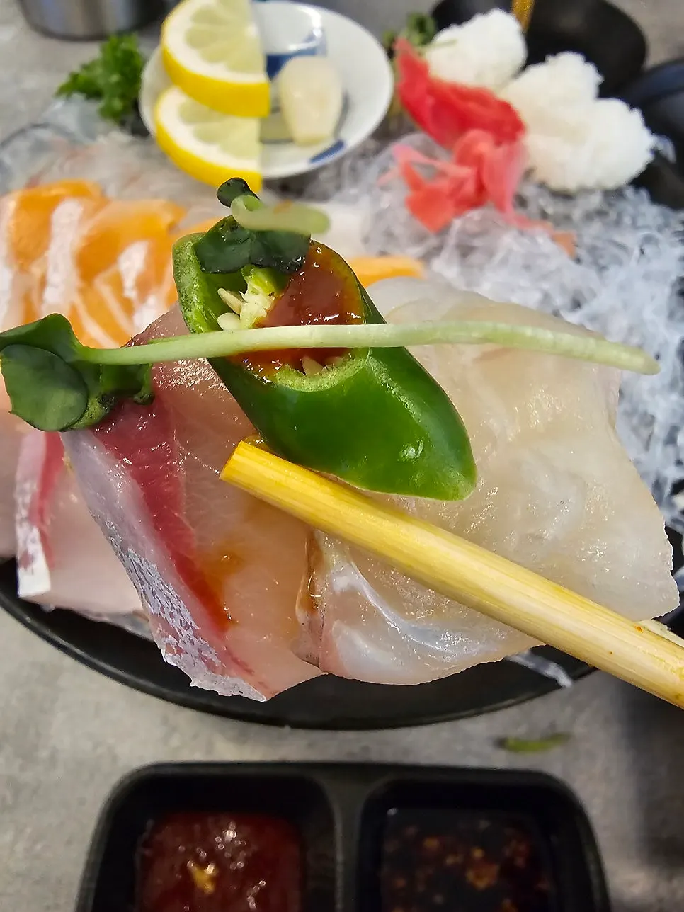 Salmon sashimi wrapped in seaweed