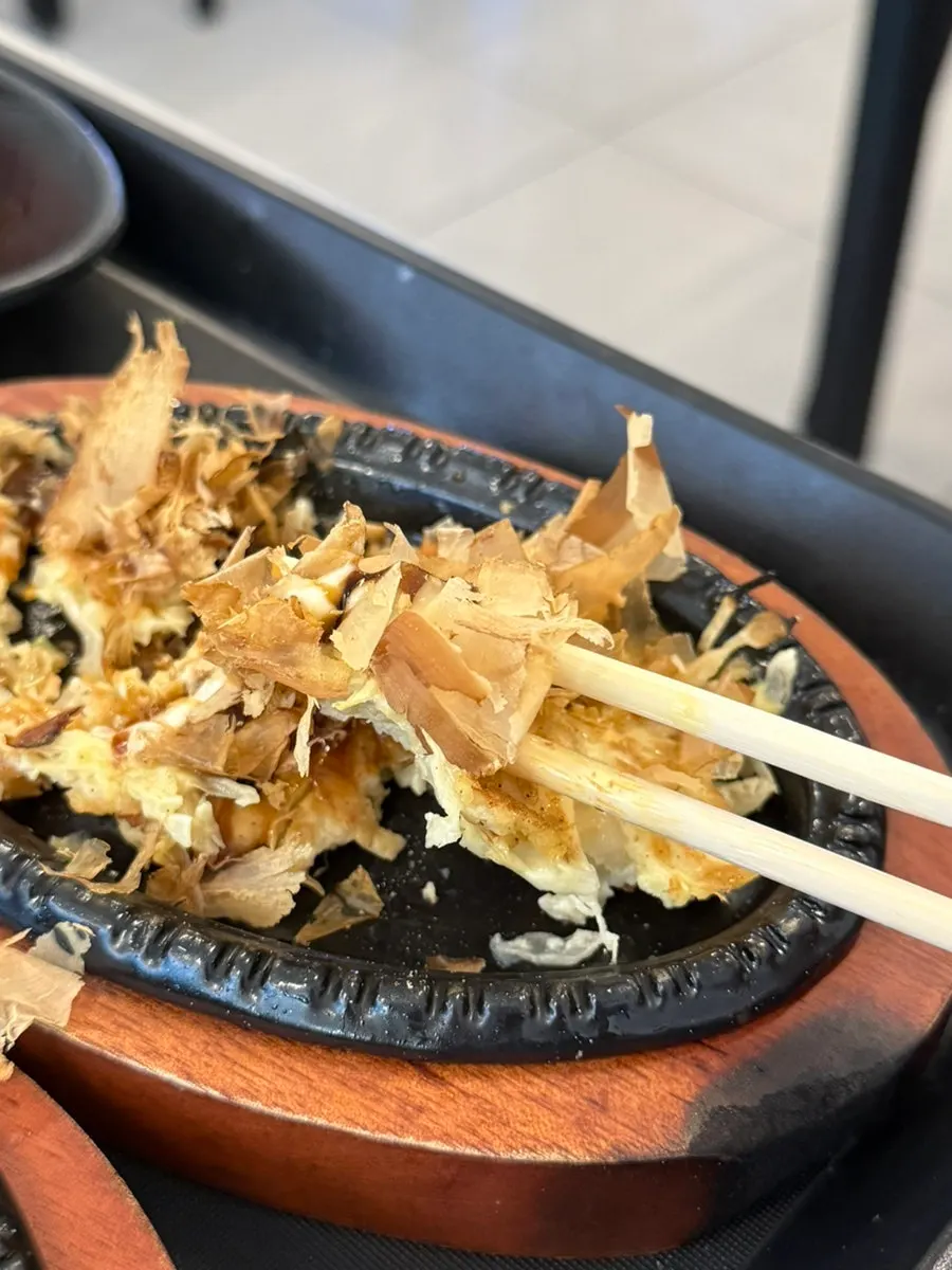 Plate of cold udon and fried snacks