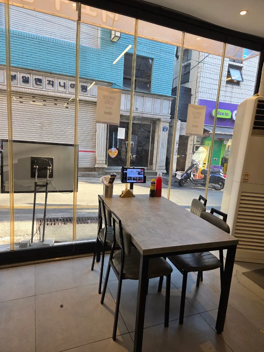 Dining hall with group tables and couple seats
