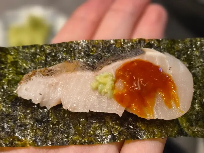 Spanish mackerel sashimi wrapped in seasoned seaweed
