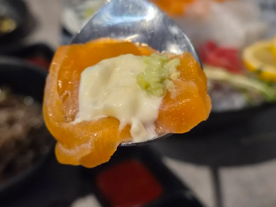 Salmon sashimi paired with tartar sauce