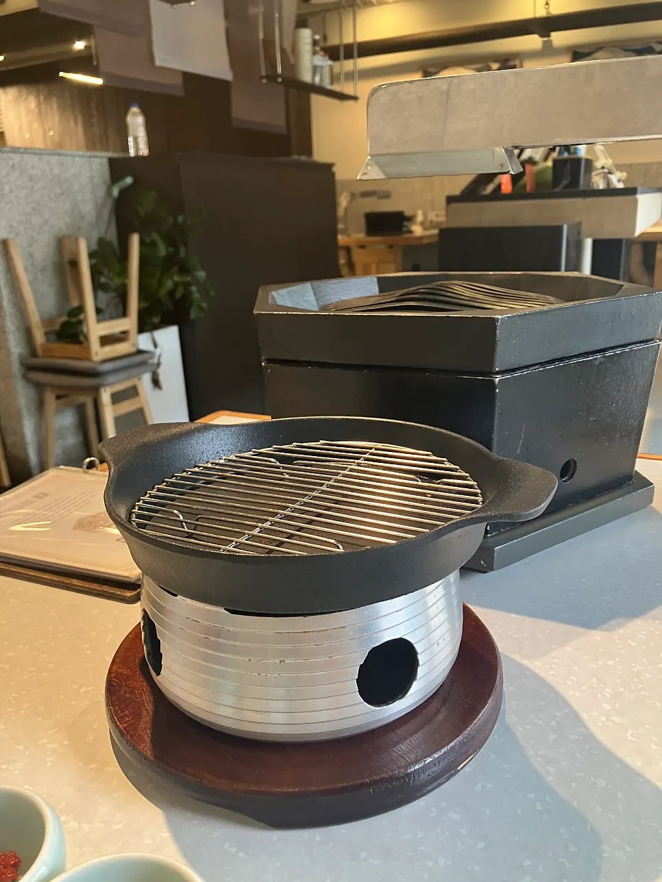 Well-heated charcoal placed on the grill
