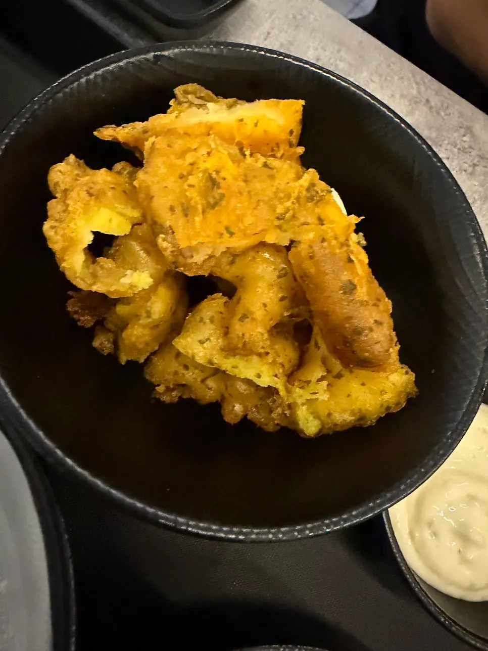 Crispy assorted fried snacks with sauce