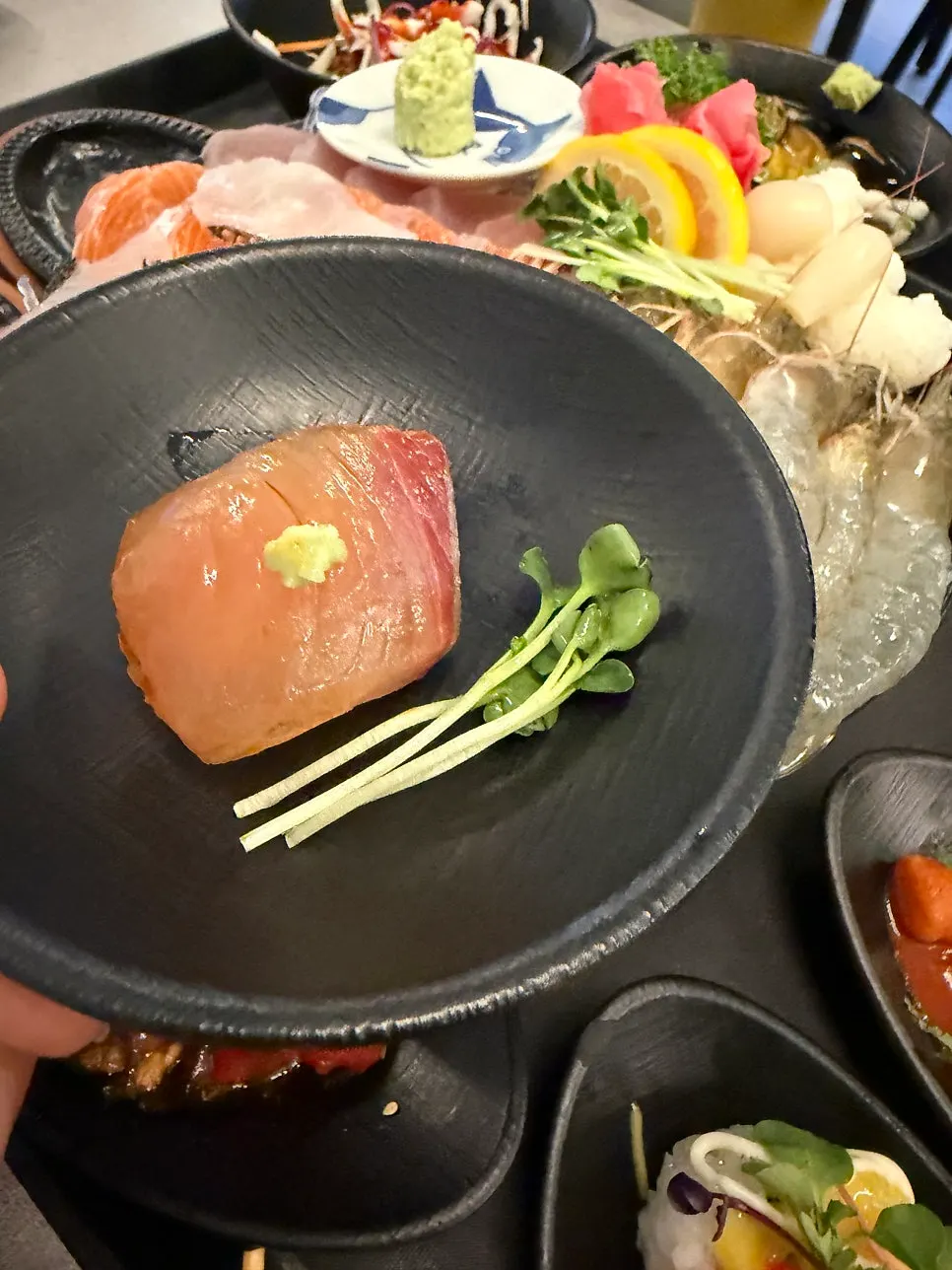 A plump piece of raw shrimp sashimi