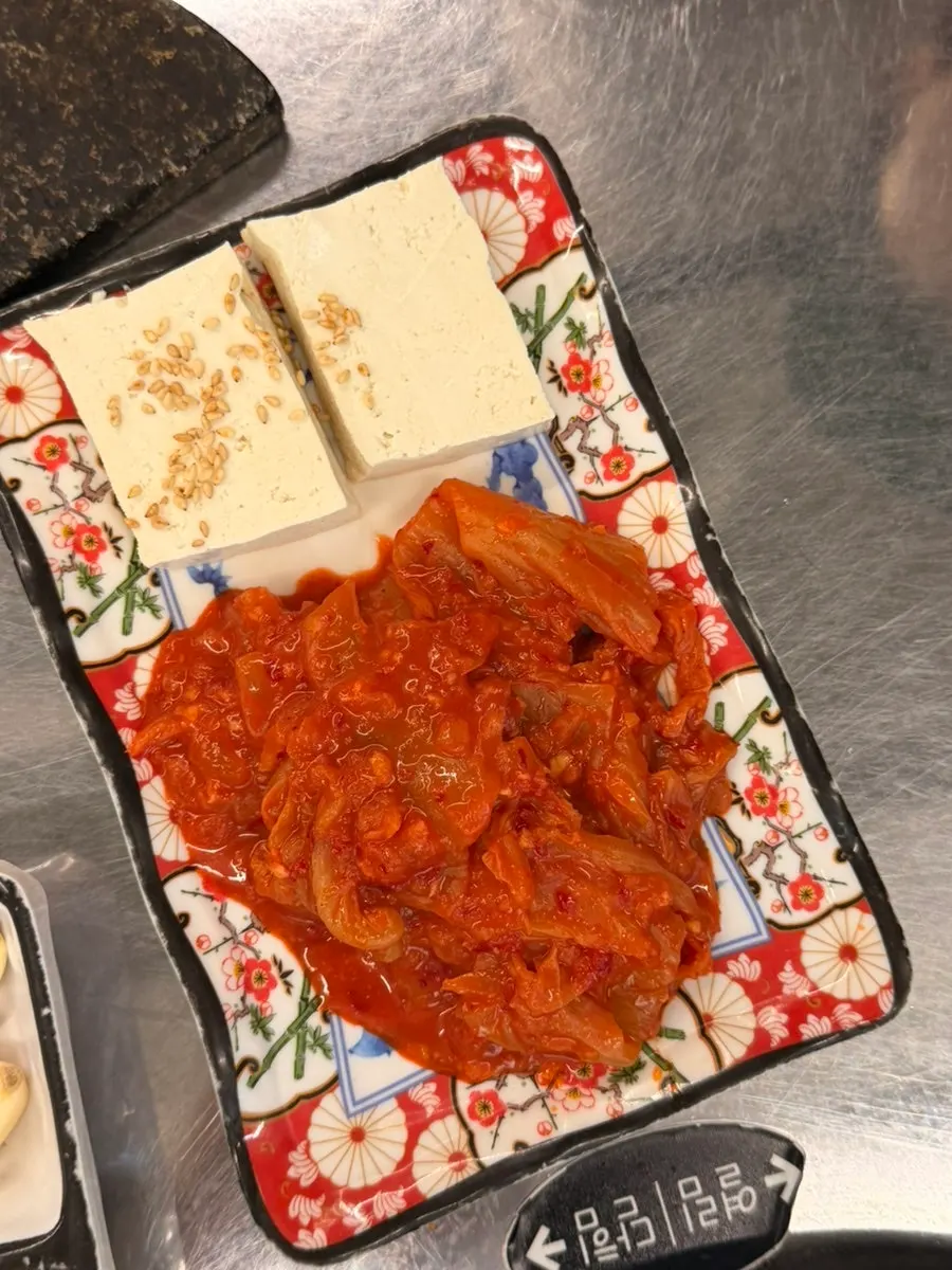 Complimentary side dishes and sauces at Dwitdon Sanghoe