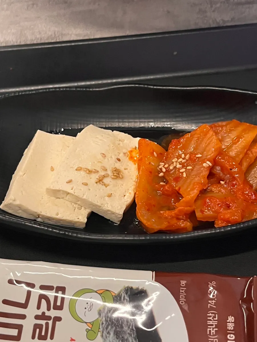 Tteokbokki and California rolls served as sides