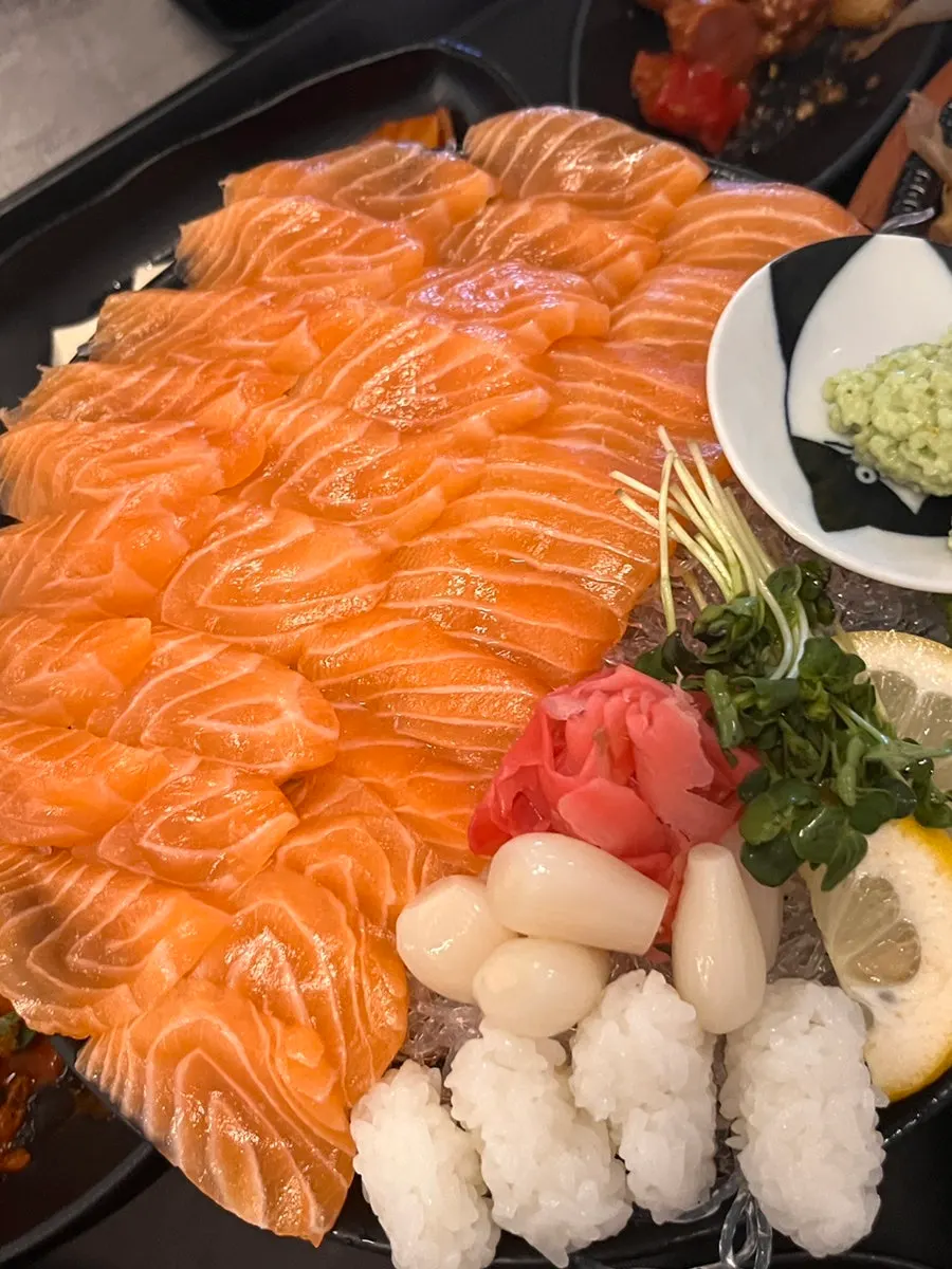 Salmon sashimi with side dishes