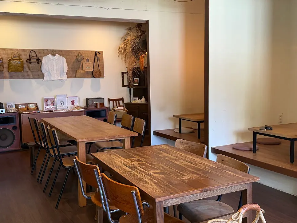 Natural light through large windows in the basement restaurant