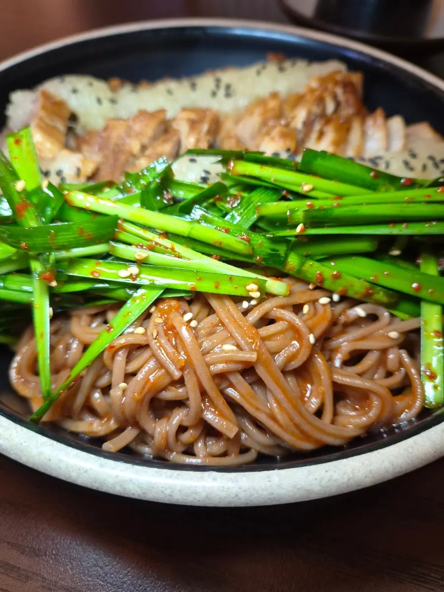 Bossam paired with chive salad