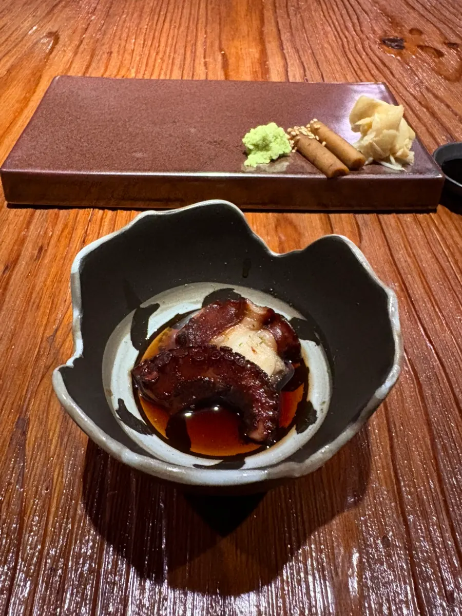 Braised bloody octopus topped with yuzu zest