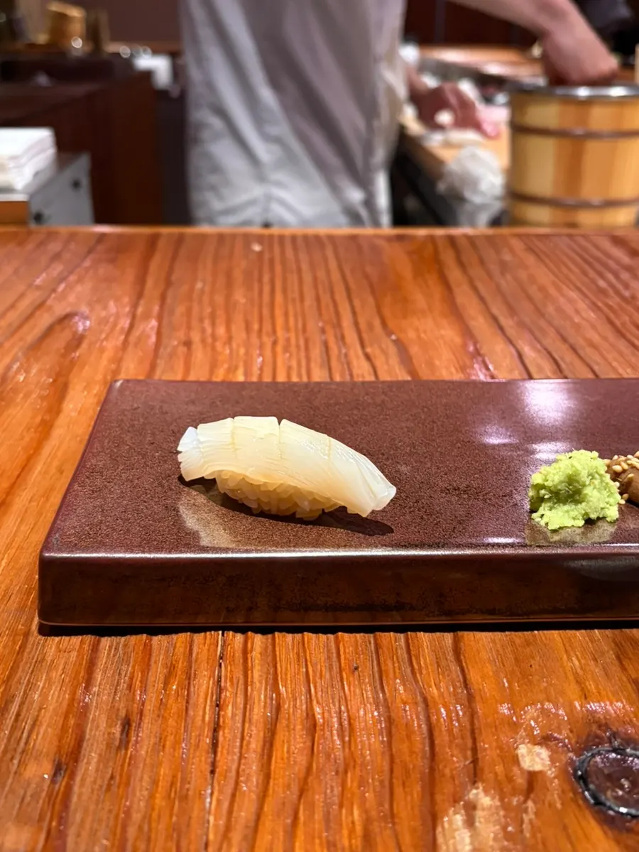 A piece of nigiri from the lunch course