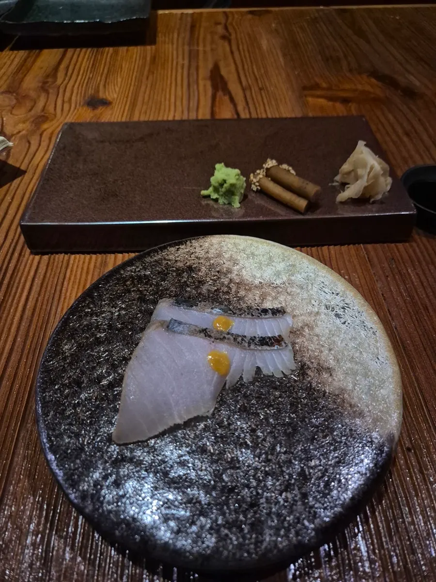 Kongguksu topped with melon and pine nuts