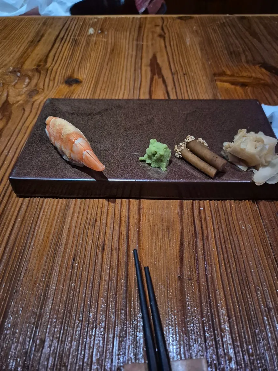 Squid sushi brushed with citrus