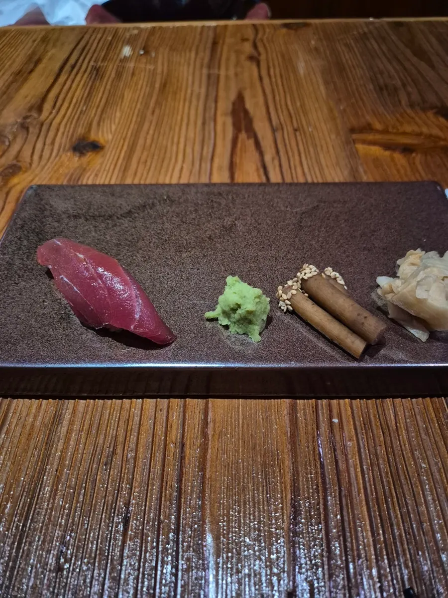 Sushi topped with sweet shrimp and uni