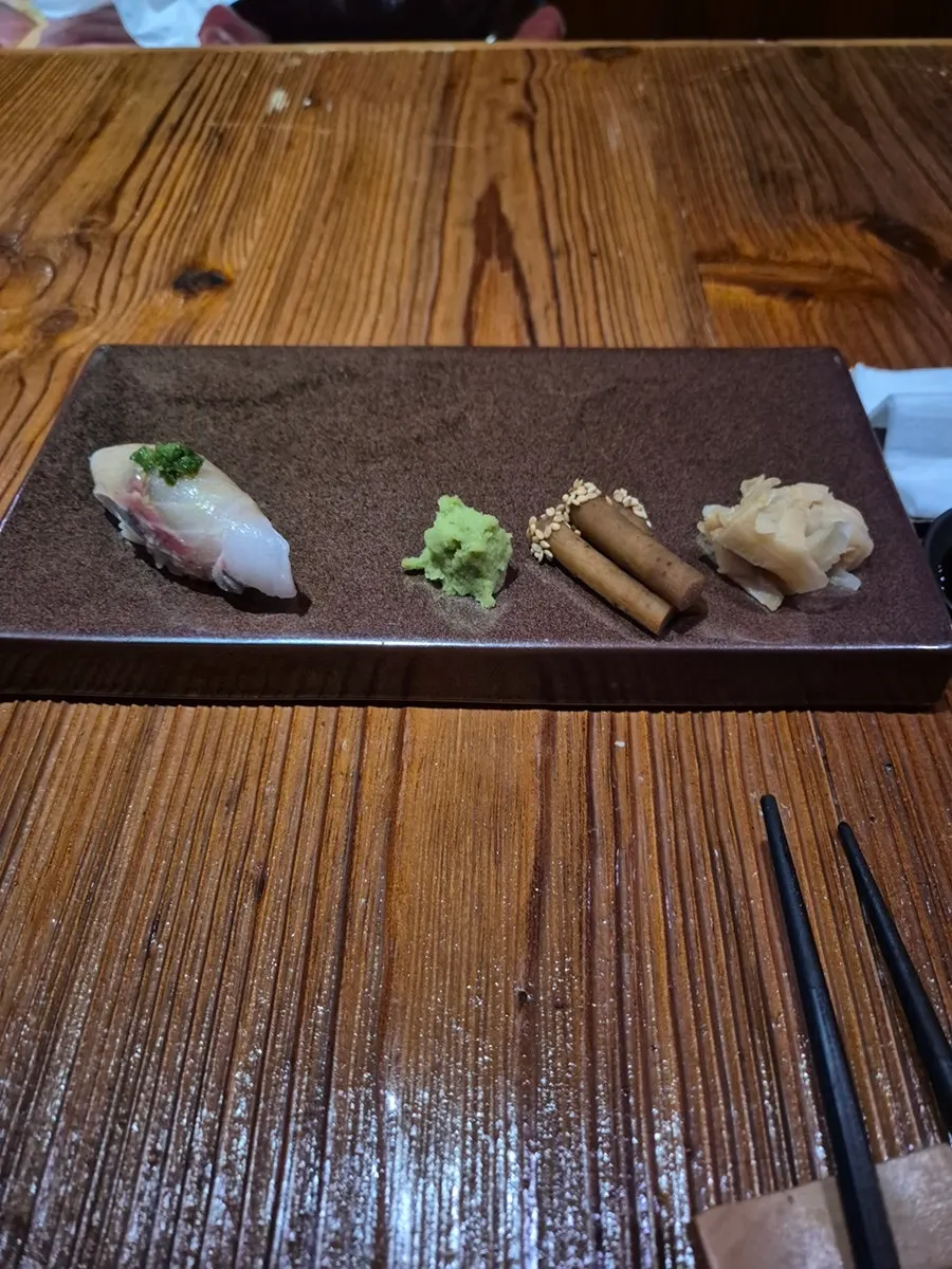A piece of tuna sushi