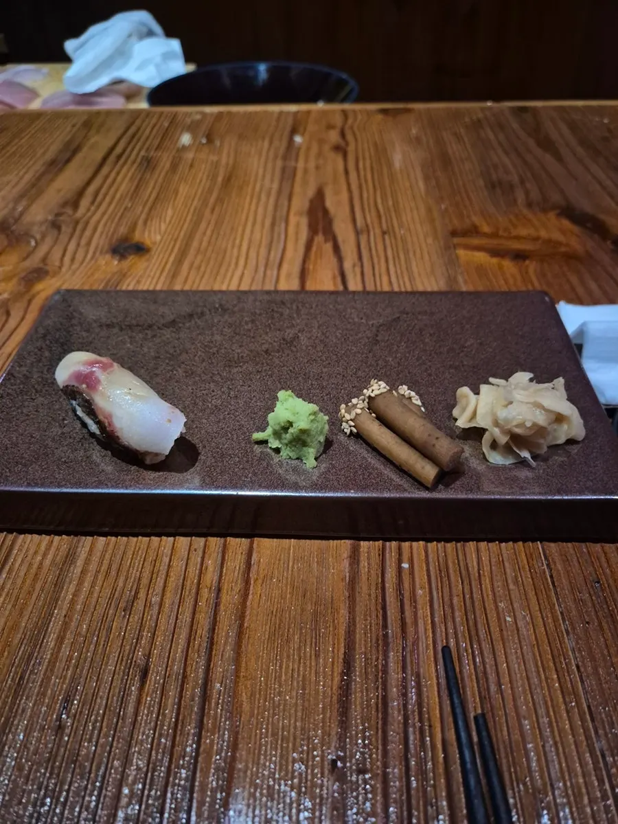 A piece of jack mackerel sushi