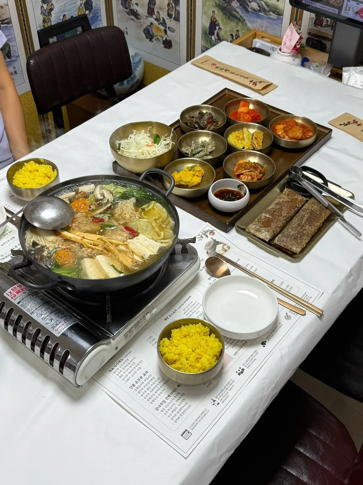 Table set for two with handmade tofu hot pot