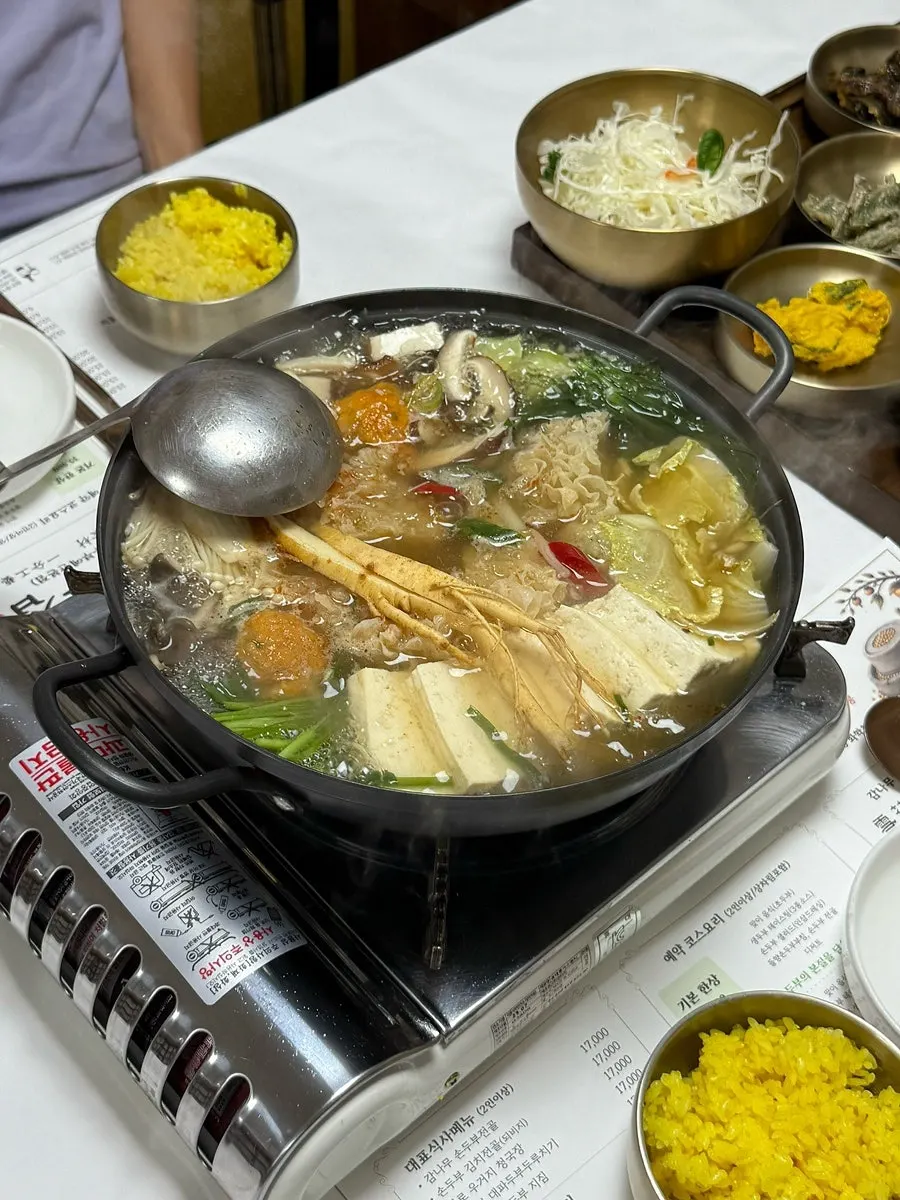 Turmeric rice served free with the hot pot