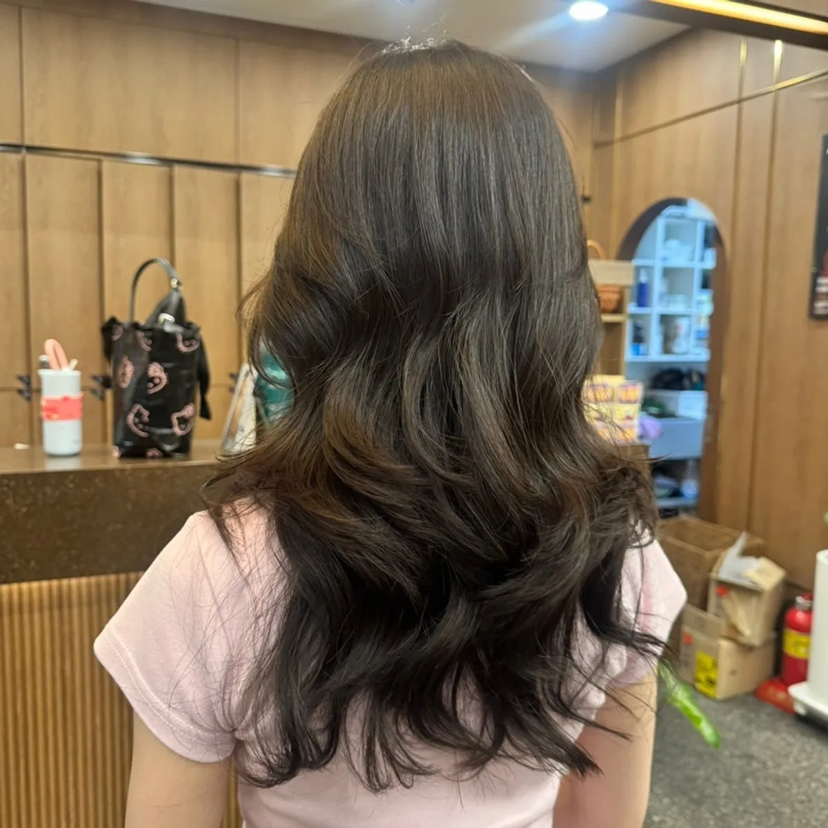 Finished long layered perm look