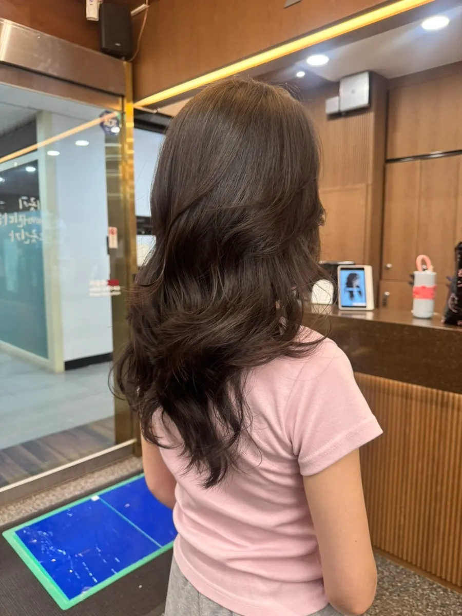 Side profile after the layered perm was finished