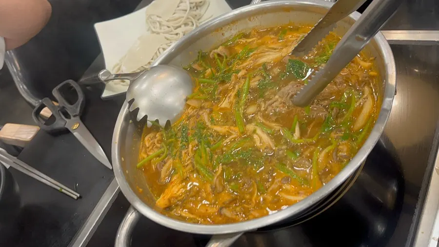 Shabu kalguksu broth available for self-serve refills