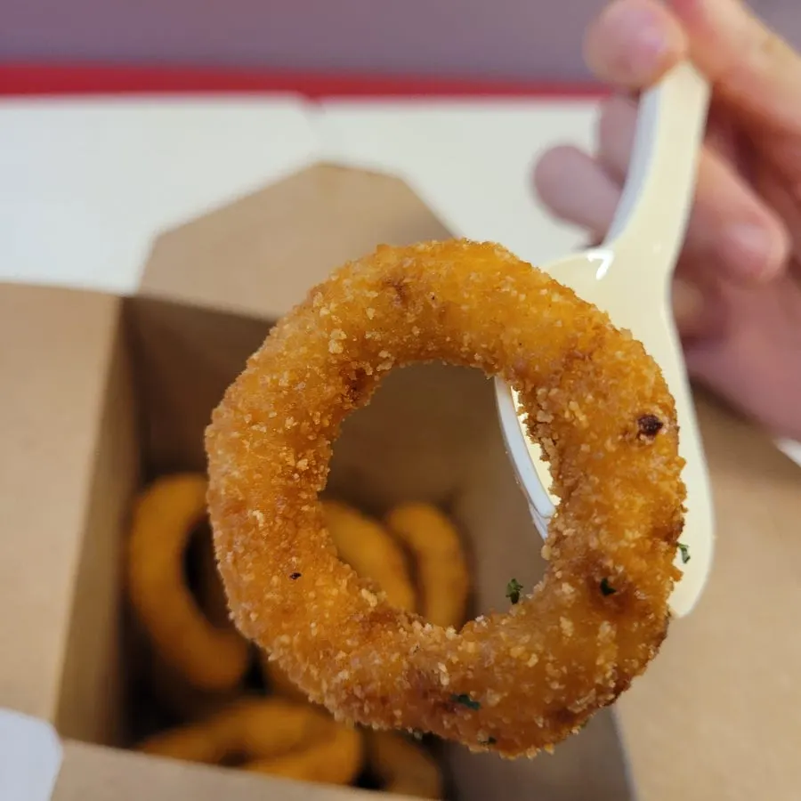 Crispy onion rings served as part of the spread