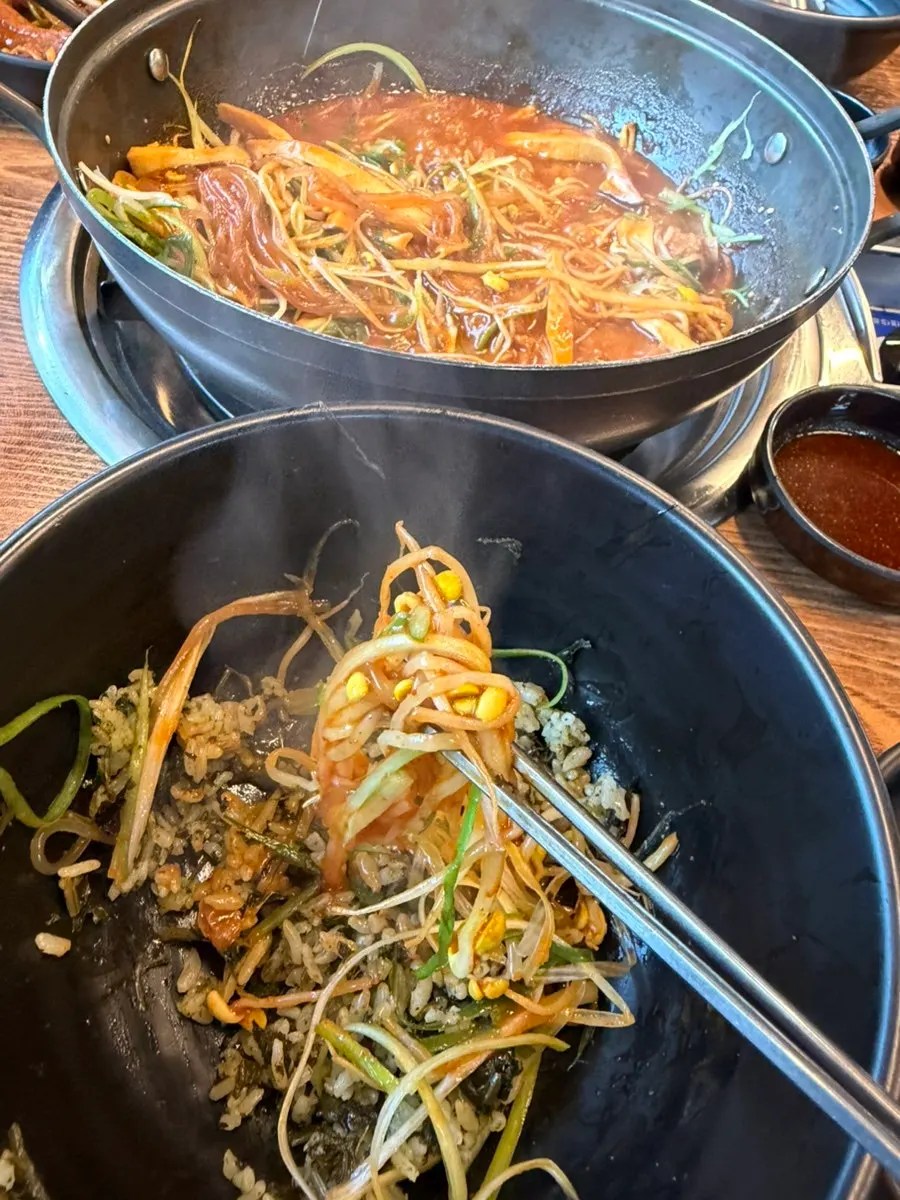 Gondre rice served alongside the braised pork ribs