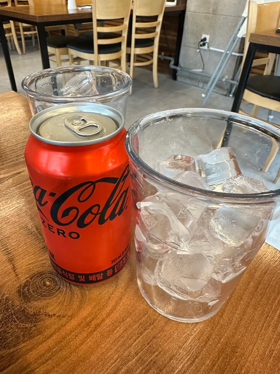 Zero Coke served with a cup of ice