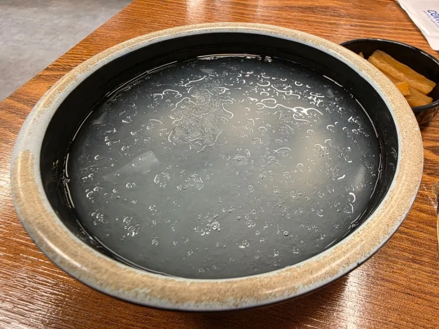Cool dongchimi served alongside the spicy braised ribs