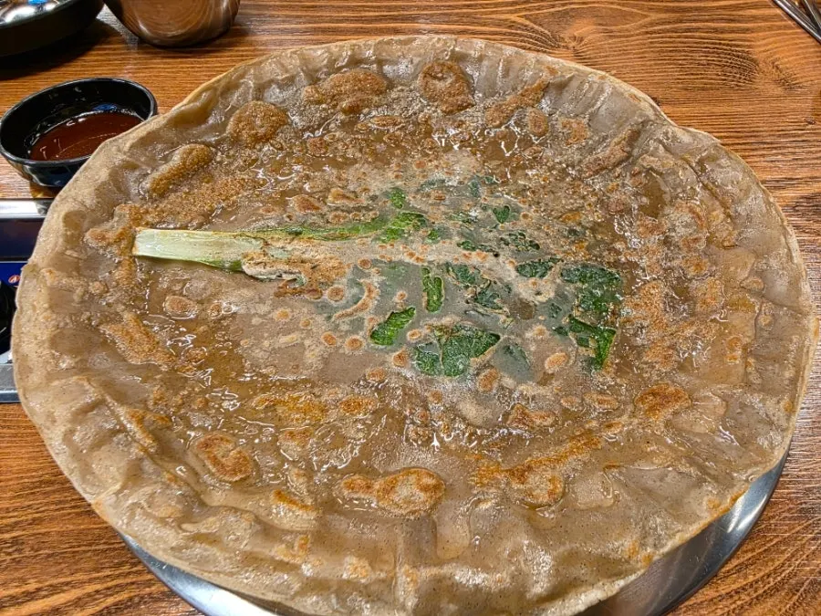 About 36cm Bongpyeong buckwheat pancake covering the plate