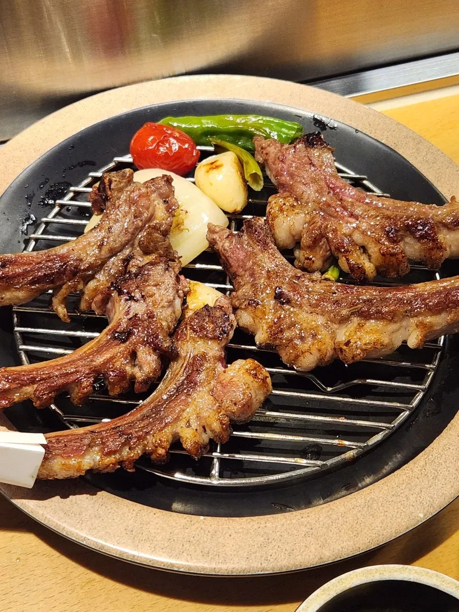 Mushrooms and vegetables grilled together with the lamb