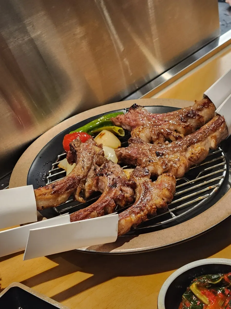 Remaining lamb and grilled vegetables on the grill