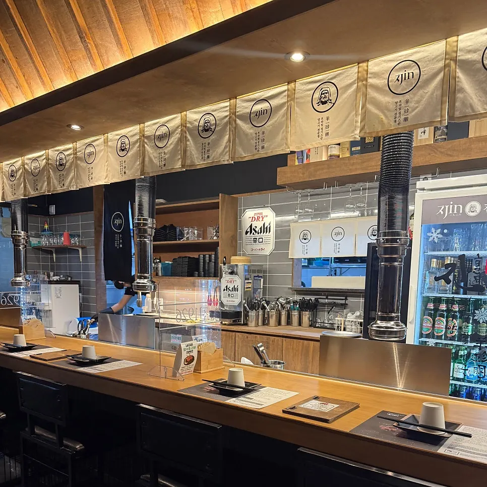Various drinks displayed on one side of the store