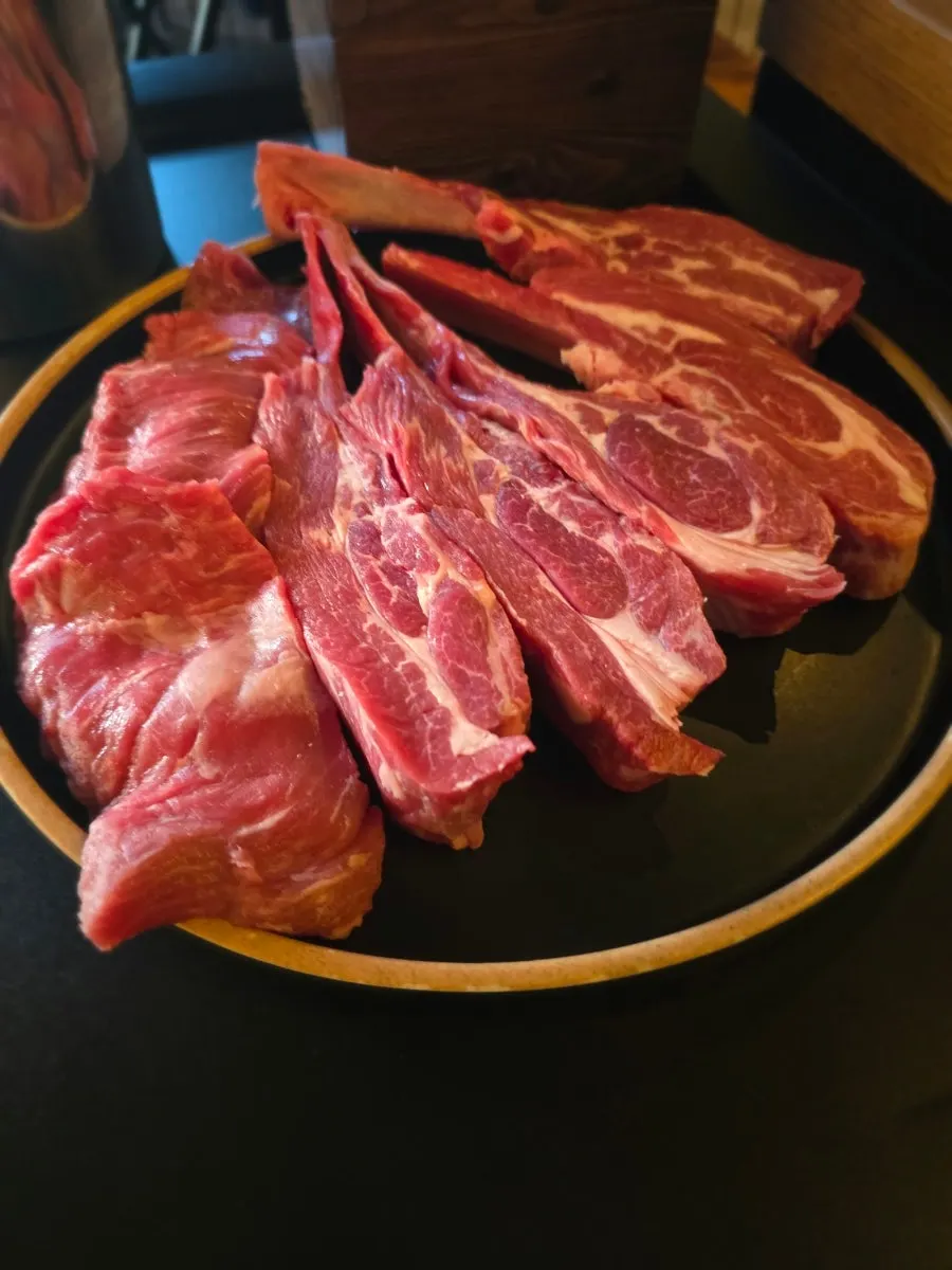 Plate of raw lamb chuck flap